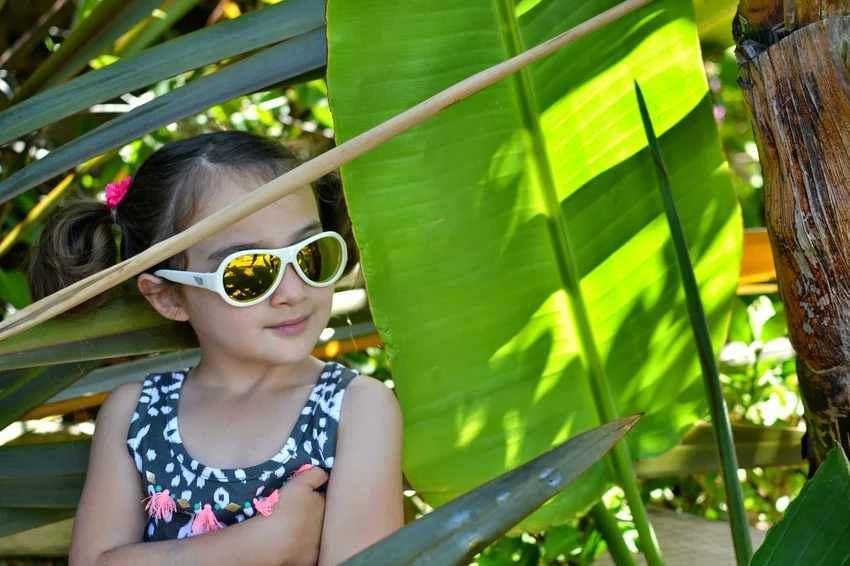 kayla in trees wearing babiators