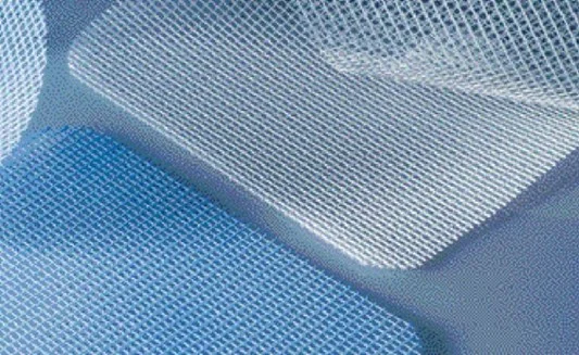 Hernia reconstruction using tissue-friendly plastic mesh.