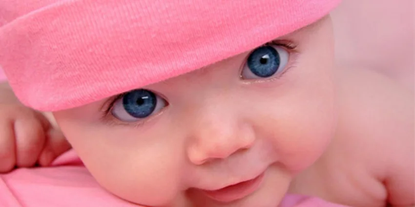 Newborn baby with blue eyes