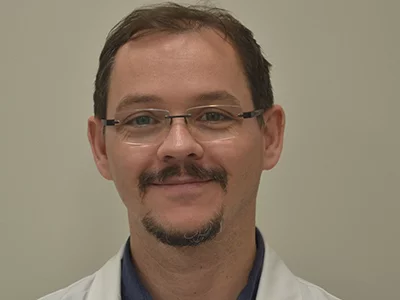 Dr. Thoman András
